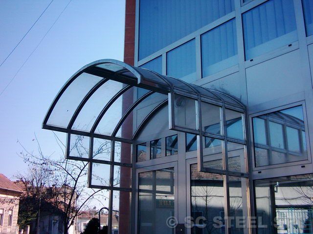 Copertină din inox și sticlă